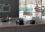 כיריים אינדוקציה Miele KMDA 7676 FL-U עם קולט אדים משולב 7